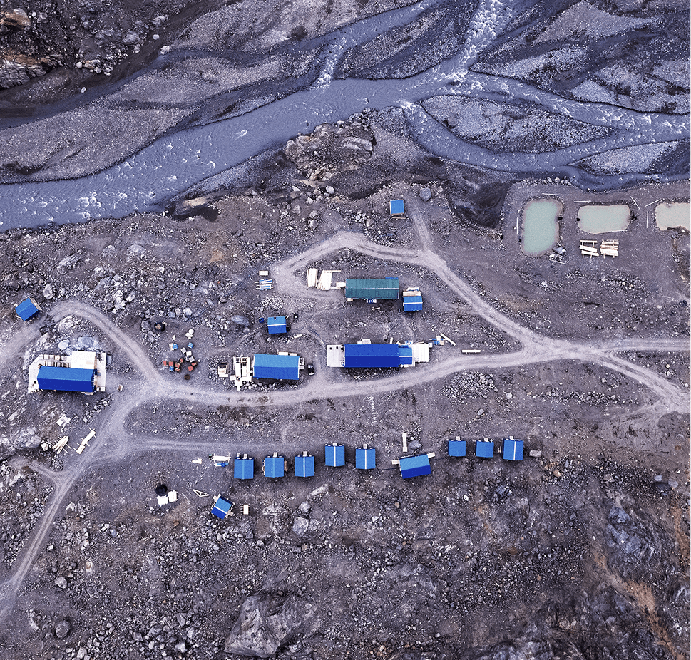Treaty Creek Mining Site With Mountain Backdrop